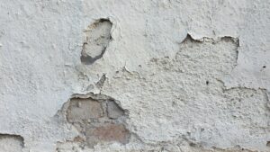 property value- Cracks on Concrete Wall